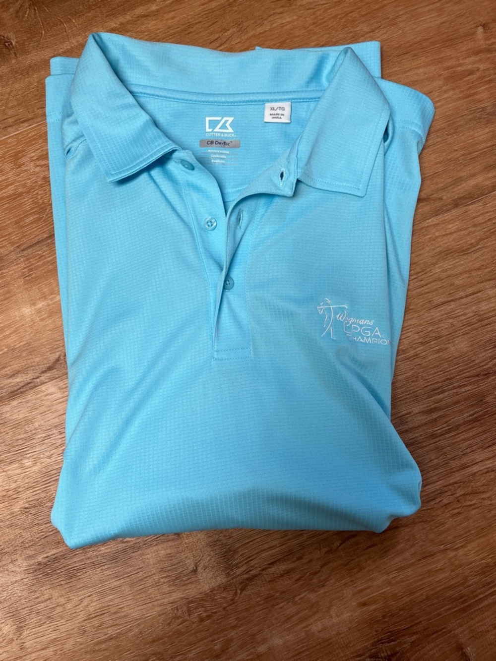 Cutter & Buck Men’s Aqua Performance Polo - PGA Champions Logo